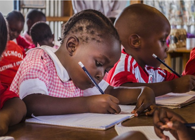 Children learning together in a BWI-supported classroom